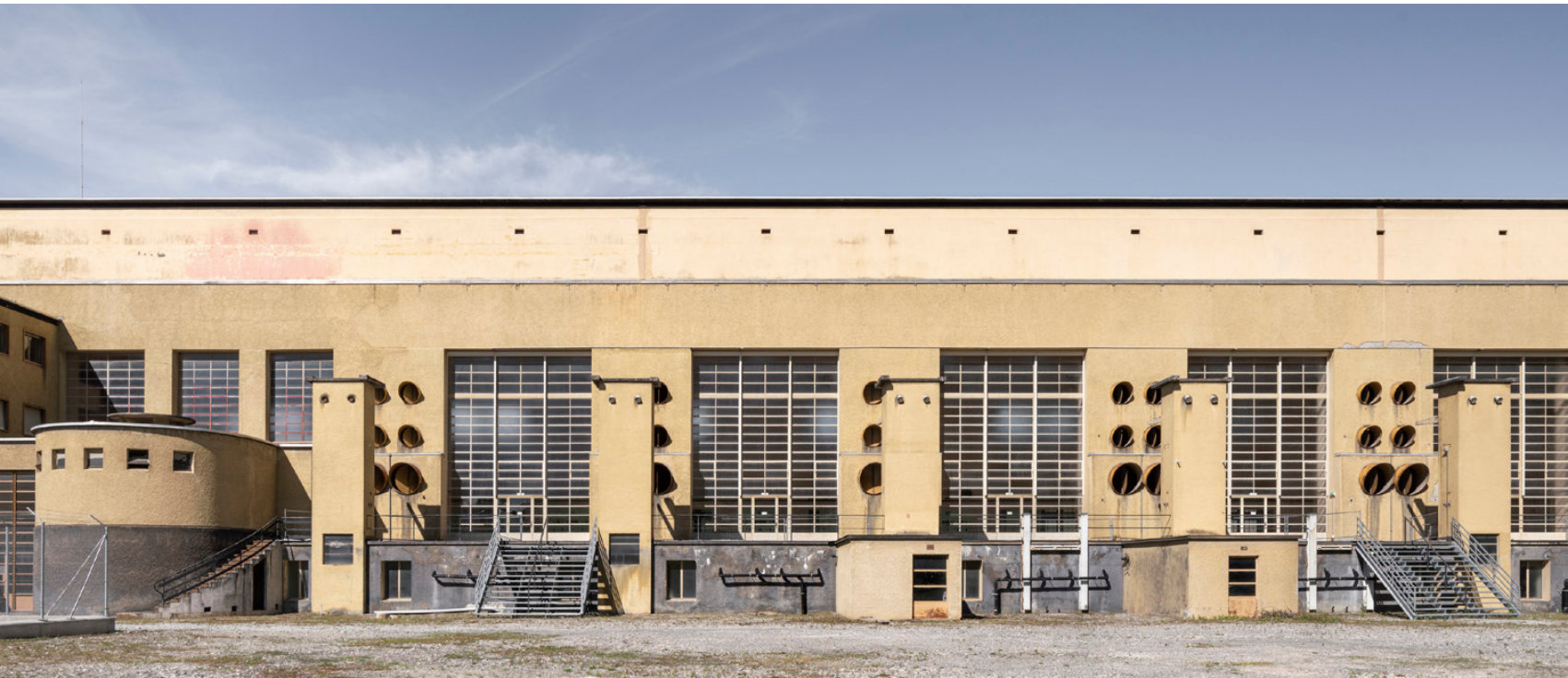 Long facade of the historic hydroelectric power plant in Sion